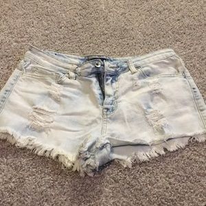 Light wash distressed jean shorts
